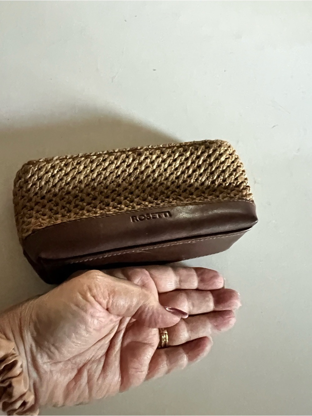 Rosetti Tan Straw and Brown Leather cosmetic bag.